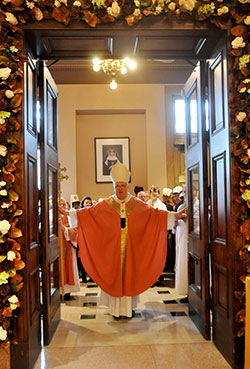 &ldquo;This is the Lord&rsquo;s gate: let us enter through it and obtain mercy and forgiveness,&rdquo; Archbishop Joseph W. Tobin declares as he opens the doors of mercy at SS. Peter and Paul Cathedral in Indianapolis on Dec. 13. (File photo by Natalie Hoefer)