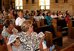 Members of the former Our Lady of Providence Parish in Brownstown sit in the church on June 26 during the final Sunday Mass celebrated there. The parish was merged on July 1 into St. Ambrose Parish in Seymour as part of the archdiocese&rsquo;s Connected in the Spirit planning process. (Submitted photo)
