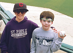 Brendan McCormick, left, and Johnny Malan had never met until a magical moment at an Indianapolis Indians&rsquo; baseball game earlier this year brought the two Catholic school students together. (Submitted photo)