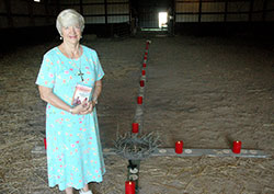 For the &ldquo;Holy Year of Mercy,&rdquo; Mary Jean Wethington created a 40-foot wooden cross inside the barn of her 18-acre farm in Dearborn County. Wethington formed the cross from pieces of wood that are &ldquo;broken, cracked and splintered&rdquo;&mdash;a description, she says, that symbolizes parts of many people&rsquo;s lives, including her relationship with her biological father. (Photo by John Shaughnessy)