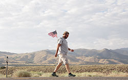 David Roth, a 23-year veteran of the Indianapolis Metropolitan Police Department, walked 3,100 miles across America this summer to honor &ldquo;the fallen, wounded and deployed&rdquo; men and women who have served in the United States military, and to raise money for a retreat home for military families. Here, he is pictured walking through Nevada in August. (Submitted photo) 