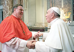 New Cardinal Joseph W. Tobin and Pope Francis enjoy a conversation inside St. Peter&rsquo;s Basilica at the Vatican on Nov. 19. (Photo courtesy L&rsquo;Osservatore Romano) 