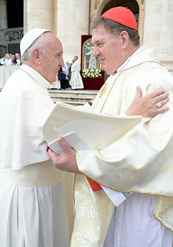 Cardinal Joseph W. Tobin shares an embrace with Pope Francis in St. Peter&rsquo;s Square at the Vatican on Nov. 20. (Photo courtesy L&rsquo;Osservatore Romano)