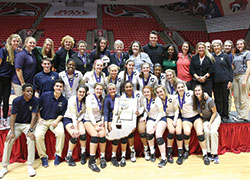 The 2016 girls&rsquo; volleyball team of Cathedral High School in Indianapolis is pictured on Nov. 5 at Worthen Arena in Muncie, Ind., after winning the Class 4A state championship. (Submitted photo) 