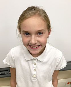 Gracie Ripperger’s brilliant smile reflects her love for her school—St. Michael School in Brookville. (Submitted photo)