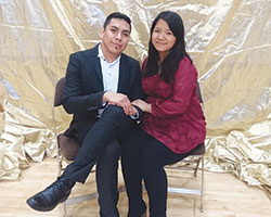 Newlyweds Luis and Clare Gomez pose for a photo at the Marriage Day Celebration reception at the Archbishop Edward T. O&rsquo;Meara Catholic Center in Indianapolis on Feb. 12 after a Mass honoring all married couples at SS. Peter and&nbsp;Paul Cathedral in Indianapolis. The Gomezes received recognition and a papal blessing during the Mass for being the most recently married couple present. (Submitted photo)