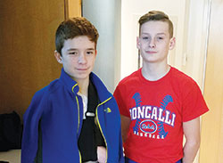 When Drew Willis, left, and John Troxell wrestled each other in a Catholic Youth Organization match on March 4, the two Catholic grade-school students didn&rsquo;t expect that their competition would become a touching lesson about friendship. (Submitted photo)
