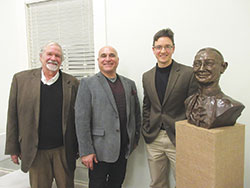 Cardinal Ritter Birthplace Foundation board chairman David Hock, left, New&nbsp;Albany sculptor Guy Tedesco and speaker Kyle Kramer pose with Tedesco&rsquo;s bonded bronze bust of Cardinal Joseph E. Ritter at the organization&rsquo;s fifth annual Irish coffee lecture on March 16 in New Albany. (Photo by Patricia Happel Cornwell)