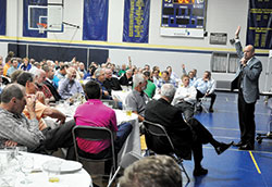 Author and speaker Glenn Bill, a member of Christ the King Parish in Indianapolis, gives a presentation on attitude on May 17 at St. Luke the Evangelist Parish in Indianapolis during the seventh annual St. Joseph&rsquo;s Men Valuing Prayer and Service Steak Dinner. The event, sponsored by the ministry at St. Luke that supports men in their faith, drew more than 200 attendees from across the Indianapolis North Deanery and beyond. (Photo by Sean Gallagher)