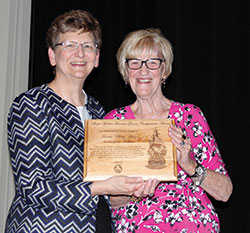 Annette &ldquo;Mickey&rdquo; Lentz receives the Saint&nbsp;Mother Theodore Gu&eacute;rin Award from Providence Sister Dawn Tomaszewski. (Submitted photo)
