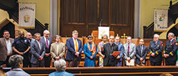 Then-Bishop Charles C. Thompson of Evansville, Ind., center, leads intercessory prayer during the city of Evansville&rsquo;s interfaith observance of the National Day of Prayer on May 4. Representatives of various faith traditions offered pray and reflection during the gathering at Trinity United Methodist Church in Evansville. Archbishop Thompson organized the yearly interfaith prayer service. (Message photo by Peewee Vasquez)