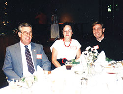 Then-Father Charles C. Thompson sits on July 1, 1990, with his parents, Coleman and Joyce Thompson, during a Priests&rsquo; Parents&rsquo; Club meeting in the Archdiocese of Louisville, Ky. (Photo courtesy Father Dale Cieslik)