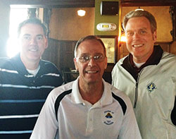 Archbishop Charles C. Thompson, center, posed for a photo with Steve Schulz, left, and Harry Freibert&mdash;two of his former teammates from Bellarmine University in Louisville where they ran cross country and track together. The photo was taken three years ago when Schulz and Freibert drove from Louisville to visit their friend, who was then the bishop of Evansville, Ind. (Submitted photo)