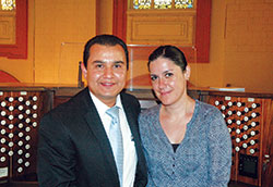 Hector and Erika Salcedo pose for a photo in the choir loft of SS. Peter and Paul Cathedral in Indianapolis on July 28, a day when Hector played the cathedral&rsquo;s pipe organ and Erika sang in the choir during the installation Mass of Archbishop Charles C. Thompson. (Photo by John Shaughnessy)