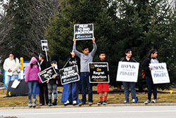 Participants in a 40 Days for Life campaign midpoint rally hold pro-life signs in front of the Planned Parenthood abortion facility in Indianapolis on March&nbsp;14, 2015. (File photo by Natalie Hoefer)