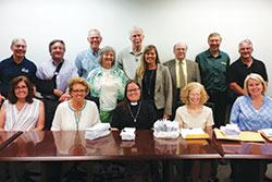 Catholics and other Christians from across central and southern Indiana pose on June 5 in the Indianapolis office of Sen. Todd Young with letters from their faith communities advocating for support of federal hunger programs. The letters were part of the annual &ldquo;Offering of Letters&rdquo; sponsored by Bread for the World, an ecumenical organization that seeks to end hunger in the U.S.&nbsp;and abroad. (Submitted photo)