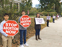 A line of pro-life witnesses extends down a street during a Life Chain rally on Oct. 1 in&nbsp;Bloomington. (Submitted photo by Marian Leahy)