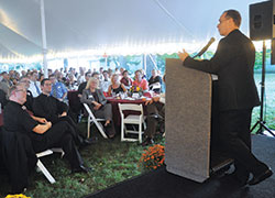 Archbishop Charles C. Thompson speaks on Sept. 21 on the grounds of Bishop Simon Brut&eacute; College Seminary in Indianapolis to approximately 170 of its supporters during its &ldquo;Celebrate Brut&eacute;&rdquo; event. (Photos by Sean Gallagher)