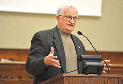 Indiana high school basketball legend Bobby Plump praises volunteers in four Catholic Charities Indianapolis programs that serve seniors during the agency&rsquo;s Hoosiers for Seniors dinner event on Oct. 19 at the Archbishop Edward T. O&rsquo;Meara Catholic Center in Indianapolis. (Photo by Sean Gallagher)