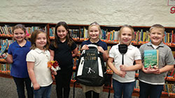 The smiles of Kaelen Hauersperger, left, Adylin Cox, Kaylen Cox, Brooklyn Woods, Eliza Kreutzjans and Drew Spurlock reflect their support for &ldquo;Team Jesus,&rdquo; the approach that guides students and staff members during this school year at St. Mary School in North Vernon. (Submitted photo)