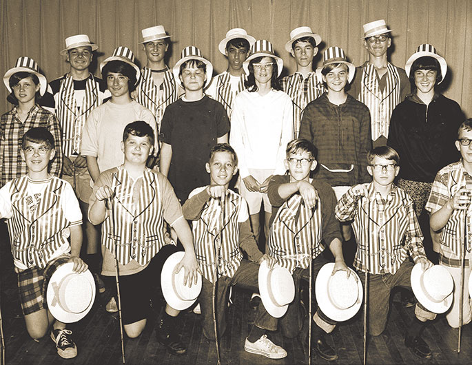 This photo shows a group of students at Holy Name of Jesus Parish in Beech Grove in April 1967 during the dress rehearsal for the annual musicale. The musicale featured appearances by the school band, the seventh-and eighth-grade chorus, and the boys’ and girls’ choirs. The production also included dances and other instrumental performances, and was directed by Holy Name’s longtime music director Jerry Craney. The parish is well-known for a strong music program, featuring an annual Christmas concert that was in its 54th year this past December.