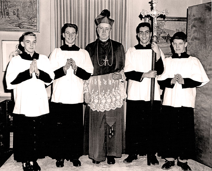 Following a confirmation liturgy, Archbishop Paul C. Schulte posed for a photograph with altar servers at St. Paul the Apostle Parish in Greencastle on March 2, 1959. From left to right in the photo are Pat Harrold, left, Bobby Tennis, Archbishop Schulte, Fleck Conrad and Paul Harrold. This photo originally appeared in the Putnam County Graphic newspaper.