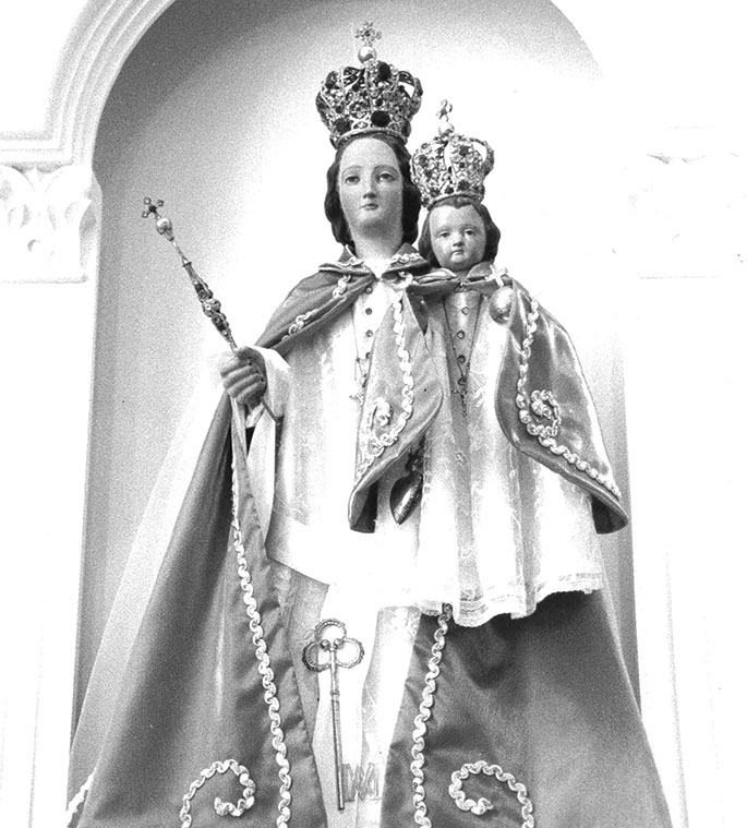 In 1863, three Civil War soldiers named Lambert Rogier, Henry Devillez and Isadore Naviaux, who were members of St. Augustine Parish in Leopold, were sent to the notorious Confederate prison camp at Andersonville, Ga. The soldiers prayed to Our Lady of Consolation, and vowed to have a statue created in her honor&mdash;if they survived the prison camp. Despite being imprisoned for 11 months, all three men survived, and Rogier traveled to Belgium to have the statue made. It was brought back to St. Augustine in 1867. For many years, the parish held a pilgrimage and novena to Our Lady of Consolation on the last Sunday in May.
