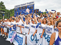 Students at Bishop Chatard High School in Indianapolis cheer on their Trojan football team on Aug. 17, the night of the first true &ldquo;home&rdquo; football game at the school&mdash;a 38-7 win over the team from Brebeuf Jesuit Preparatory School in Indianapolis. (Photo courtesy of Banayote Photography) 