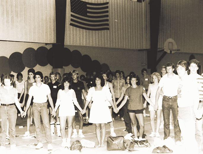 This photo depicts teens attending a Connersville Youth Deanery Day at the Golay Center in Cambridge City on Aug. 21, 1983. The event included Mass, dinner, discussion groups and social activities. The event was made possible through grants from the archdiocese for youth ministry programs that were received by four deaneries in central and southern Indiana that year.