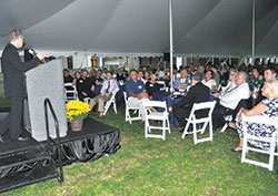 Archbishop Charles C. Thompson speaks on Sept. 17 before nearly 200 supporters of Bishop Simon Brut&eacute; College Seminary in Indianapolis. The &ldquo;Celebrate Brut&eacute;&rdquo; event took place on the grounds of the archdiocesan college seminary. (Photo by Sean Gallagher)