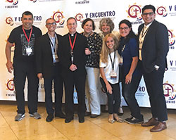 The members of the archdiocese&rsquo;s delegation to the V Encuentro gathering in late September in Texas pose for a group photo: Francisco Ruiz, left, Oscar Castellanos, Archbishop Charles C. Thompson, Giselle Duron, Anne Corcoran (back), Dianna Perez (front), Gabriela Ross and Saul Llacsa. (Submitted photo)