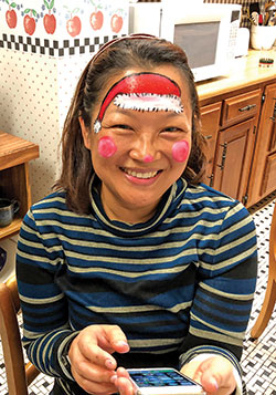 Providence Sister Teresa Kang practices face painting on Nov. 28, 2017, at Corbe House on the grounds of the motherhouse of the Sisters of Providence of Saint Mary-of-the-Woods in St.&nbsp;Mary-of-the-Woods. (Submitted photo)