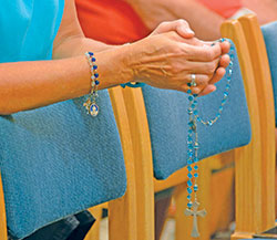 People pray on Sept. 15 in SS. Peter and Paul Cathedral in Indianapolis during a &ldquo;Holy Hour for Prayer, Penance and Healing&rdquo; for victims of sexual abuse. Three parishes in the Indianapolis North Deanery held listening sessions or a similar holy hour in response to the current clergy sexual abuse crisis. (Photo by Natalie Hoefer)