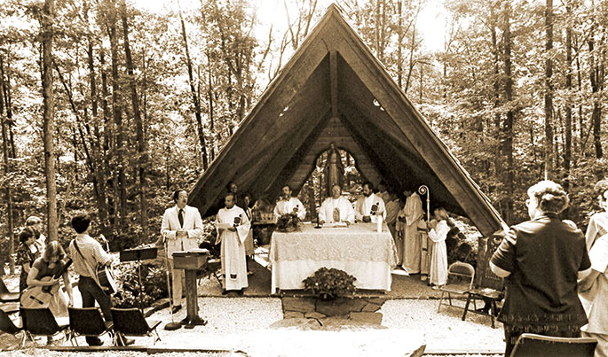 On Aug. 15, 1982, Archbishop Edward T. O’Meara celebrated the dedication Mass for the Blessed Virgin grotto at St. Agnes Parish in Nashville. Archbishop O’Meara can be seen at the center of the photo. St. Agnes Parish was founded in 1940 and was at the north end of the town when this liturgy took place. The parish relocated to a new location at the west end of Nashville in 2003.