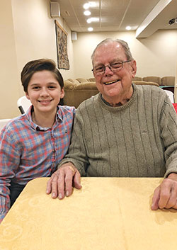 Eli Aldrich, left, shares more than a winning smile with his great-grandfather, Paul Hornberger. They are also part of their family&rsquo;s amazing streak of Catholic education. (Submitted photo)