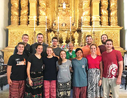 Josh Mears, third from left in the back row, poses with members of his mission team in the church where the incorrupt body of St. Francis Xavier is buried in Goa, India. The mission trip last spring played a large part in Mears, a junior at Indiana University-Purdue University Indianapolis, joining the campus&rsquo; Catholic Student Organization. He is a catechumen and will be received into the full communion of the Church this Easter. (Submitted photo)