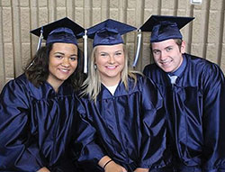 Marcella Murphy, left, Gabbi Roberts and Trey Crawford celebrate their 2018 graduation from Our&nbsp;Lady of Providence High School in Clarksville. (Submitted photo)