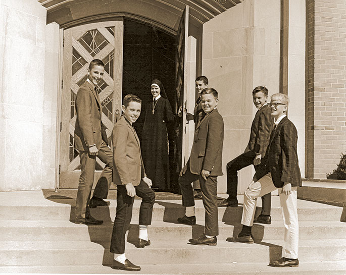 In this photo, Franciscan Sister Ramona Lunsford, a teacher at St. Michael the Archangel School in Indianapolis, is shown with students who would appear with her on an episode of “Sister Says,” a local Catholic television program that aired on WISH during the 1960s. The episode was part of a series titled, “A Tour Through the Roman Catholic Church.” The students were all part of a boys’ choir that performed during the episode. From left to right, the boys are: Jay Koffskey, Mark Haag, Duane Fricke, Mike Fleetwood, Pat Hennessy and Chris Crockett. This photo originally appeared in The Criterion on Oct. 29, 1965.