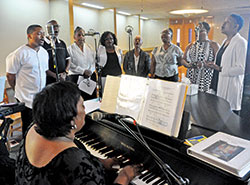 Members of the choir of St. Rita Parish in Indianapolis sing during an Aug. 3 Mass at the faith community&rsquo;s church to mark the 100th anniversary of its founding. (Photo by Sean Gallagher)