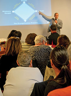 Members of parishes throughout central and southern Indiana listen and take notes as Tim Glemkowski of L&rsquo;Alto Catholic Institute presents on evangelization during a workshop sponsored by the archdiocesan Office of Evangelization on Oct. 27, 2018, at St. Bartholomew Parish in Columbus. (File photo by Natalie Hoefer)