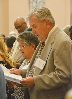 Barbara and Thomas Rzepka of St.&nbsp;Gabriel the Archangel Parish in Indianapolis sing during the annual archdiocesan Golden&nbsp;Wedding Anniversary Mass at SS.&nbsp;Peter and Paul Cathedral in Indianapolis on Aug.&nbsp;25. They were among the 68 couples from 37&nbsp;parishes throughout central and southern Indiana who worshipped at the Mass to celebrate their 50th anniversary. (Photo by Natalie Hoefer)