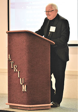 Oblates of Mary Immaculate Father Ronald Rolheiser addresses participants in the archdiocesan Consolation Ministry&rsquo;s Mission Day event in Indianapolis on Sept. 10. (Photo by Natalie Hoefer)