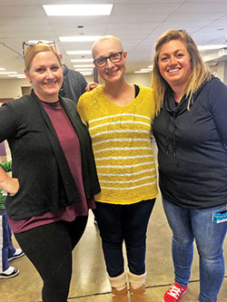During a difficult period in her family&rsquo;s life, Norah Kinderman, center, and her family have been blessed by the caring efforts of her former high school classmates, including Patty Belden, left, and Kelly Duggins. (Submitted photo)