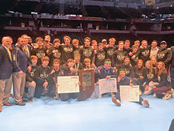 The Cathedral High School wrestling team displays its hardware after winning its third straight team championship in the Indiana High School Athletic Association&rsquo;s Wrestling State Finals at Bankers Life Fieldhouse in Indianapolis on Feb. 22. (Submitted photo)