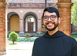 Benedictine Brother Lorenzo Penalosa, a monk of Saint Meinrad Archabbey in St. Meinrad, stands on March 29 in a courtyard of the Collegio Sant&rsquo;Anselmo in Rome, which is a residence for Benedictines from around the world studying or ministering in Rome. (Submitted photo)