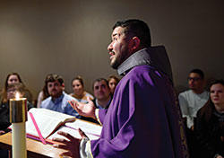Conventual Franciscan Father Mario Serrano, vocations director for his order&rsquo;s Our Lady of Consolation Province, which is based in Mount St. Francis in the New Albany Deanery, preaches during a March 8 Mass on the campus of the University of Texas El Paso in El Paso. (Submitted photo)