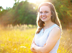 Photo: St. Joan of Arc parishioner Perry Langley&rsquo;s story of faith and transformation began as a teenager at a &ldquo;Consumed&rdquo; retreat that especially touched and changed her. (Submitted photo courtesy of Andrea Kuhn Photography)
