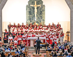 Joseph Chrisman, pastoral associate for music and faith formation at Holy Name of Jesus Parish in Beech Grove, conducts Holy Name&rsquo;s annual Christmas concert in 2019. (Submitted photo by Robert Parsons)