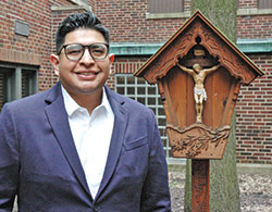 As the coordinator of Hispanic Ministry for the archdiocese, Saul Llacsa has drawn upon his mother&rsquo;s wisdom to lead people closer to God. (Photo by John Shaughnessy)