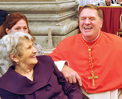 Cardinal Joseph W. Tobin spends time with his mother Marie on Nov. 19, 2016, the day he was installed into the College of Cardinals, in St. Peter&rsquo;s Basilica at the Vatican. (File photo by John Shaughnessy)